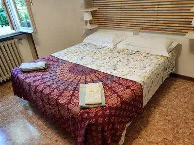 Letto o letti in una camera di Casa Zoe