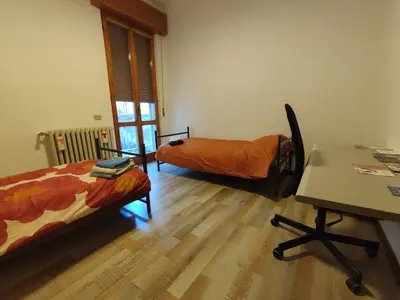 Letto o letti in una camera di Casa Zoe