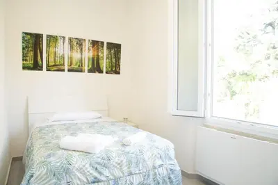 Letto o letti in una camera di Guest House Garden dei Mille