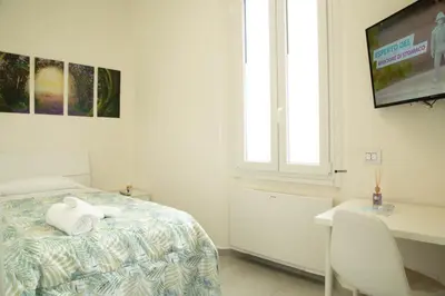 Letto o letti in una camera di Guest House Garden dei Mille