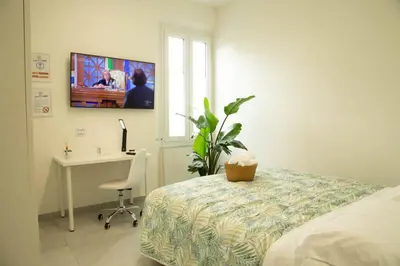 TV o dispositivi per l'intrattenimento presso Guest House Garden dei Mille