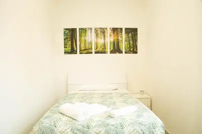 Letto o letti in una camera di Guest House Garden dei Mille