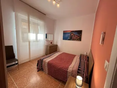 Letto o letti in una camera di Nuovo appartamento Vicino a Portofino