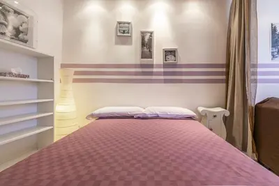 Letto o letti in una camera di MonoliVi 35 - Affitti Brevi Italia