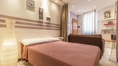 Letto o letti in una camera di MonoliVi 35 - Affitti Brevi Italia
