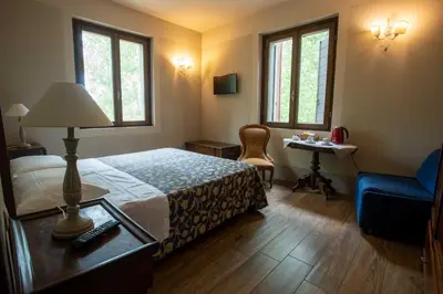 Letto o letti in una camera di La Finestra sul Po - Agriturismo