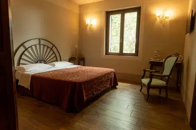 Letto o letti in una camera di La Finestra sul Po - Agriturismo