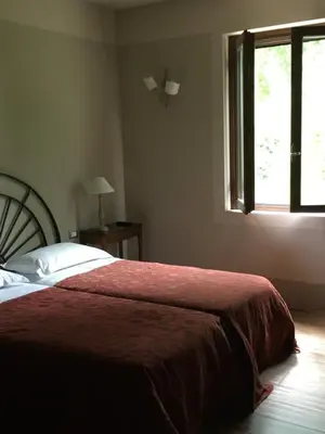 Letto o letti in una camera di La Finestra sul Po - Agriturismo