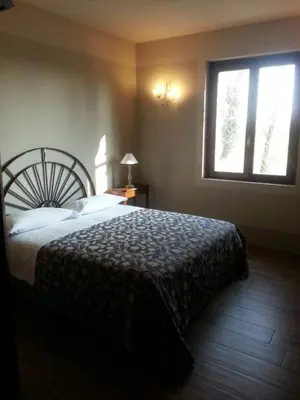 Letto o letti in una camera di La Finestra sul Po - Agriturismo