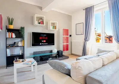TV o dispositivi per l'intrattenimento presso Luxury Apartment next to the Francescana