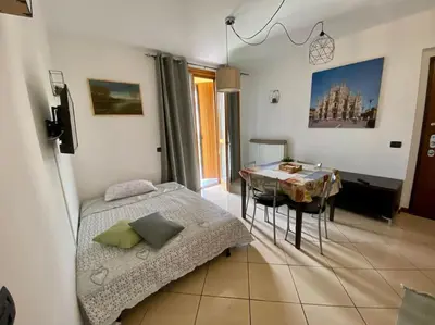 Letto o letti in una camera di Bilocale via Visconti
