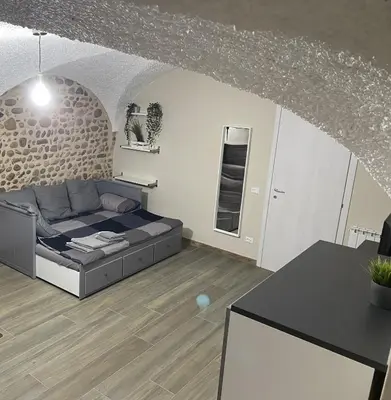 Area soggiorno di Appartamento B&B C'era una volta