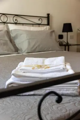 Letto o letti in una camera di Appartamento Nonna Lidia