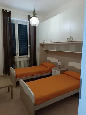 Letto o letti in una camera di La Casa sull'argine 2