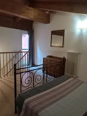 Letto o letti in una camera di La Casa sull'argine 2