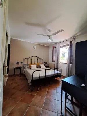 Letto o letti in una camera di B&B Tenuta Campo Magliano