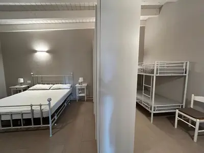 Letto o letti in una camera di Casetta rossa