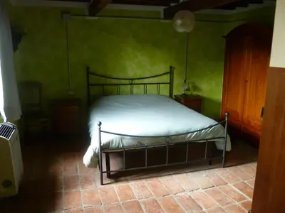 Letto o letti in una camera di Casolare Fratina