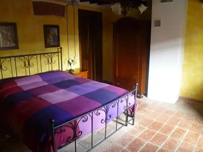 Letto o letti in una camera di Casolare Fratina