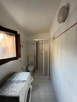 Letto o letti in una camera di casa margherita