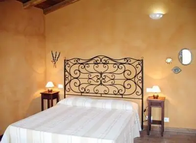 Letto o letti in una camera di Agriturismo La Villa