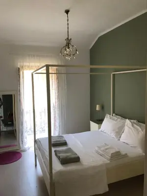 Letto o letti in una camera di Casa Tesor - your design home in Mantua city center