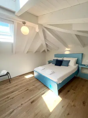 Letto o letti in una camera di NAVETTA