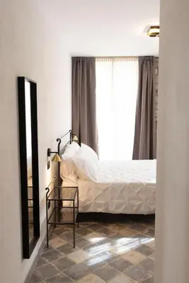 Letto o letti in una camera di Villa Antonietta Toscana Lunigiana piscina privata
