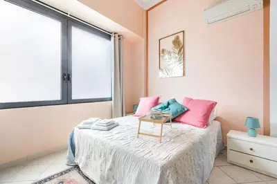 Letto o letti in una camera di Open Space a 1' dalla Stazione