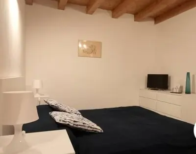 Letto o letti in una camera di b&b La Divina Pietra