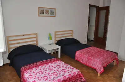 Letto o letti in una camera di Olivia