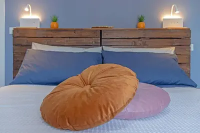 Letto o letti in una camera di Oasi urbana near Osteria Francesana