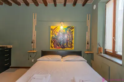 Letto o letti in una camera di FuoriPorta Affitti Brevi - Monolocale Emanuele 4