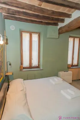 Letto o letti in una camera di FuoriPorta Affitti Brevi - Monolocale Emanuele 4