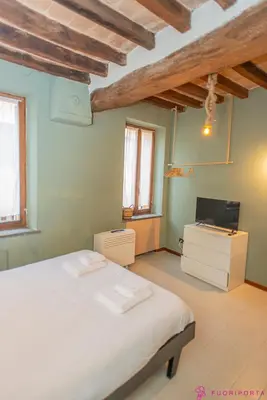 Letto o letti in una camera di FuoriPorta Affitti Brevi - Monolocale Emanuele 4
