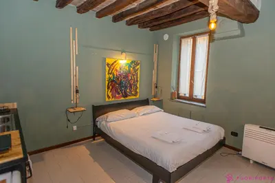 Letto o letti in una camera di FuoriPorta Affitti Brevi - Monolocale Emanuele 4