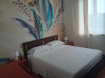 Letto o letti in una camera di Locanda Il Portone