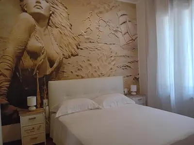 Letto o letti in una camera di Locanda Il Portone