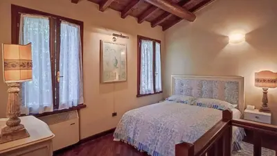 Letto o letti in una camera di La casetta nel bosco