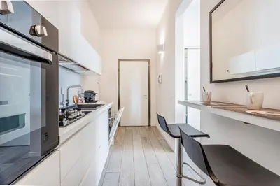 Cucina o angolo cottura di Urban Comfort Stay near Ferrari museum & Railway