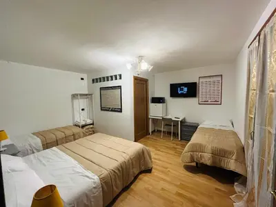 Letto o letti in una camera di B&B LE AMARENE