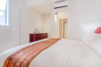 Letto o letti in una camera di Red Ferrari House - City center
