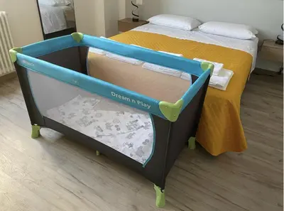 Letto o letti in una camera di Il Campanone - Sassuolo Centro - parcheggio auto coperto - Neflix e Amazon Prime