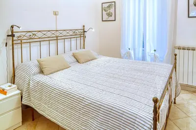 Letto o letti in una camera di Oliva House