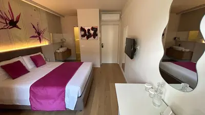 Letto o letti in una camera di SAN LORENZO Luxury Boutique