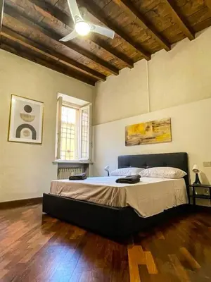 Letto o letti in una camera di [Vista sulla Basilica]