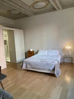 Letto o letti in una camera di BB A PARMA DUOMO