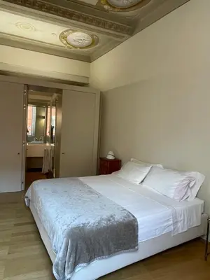 Letto o letti in una camera di BB A PARMA DUOMO