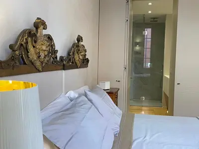Letto o letti in una camera di BB A PARMA DUOMO