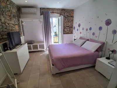 Letto o letti in una camera di Appartamento Elia